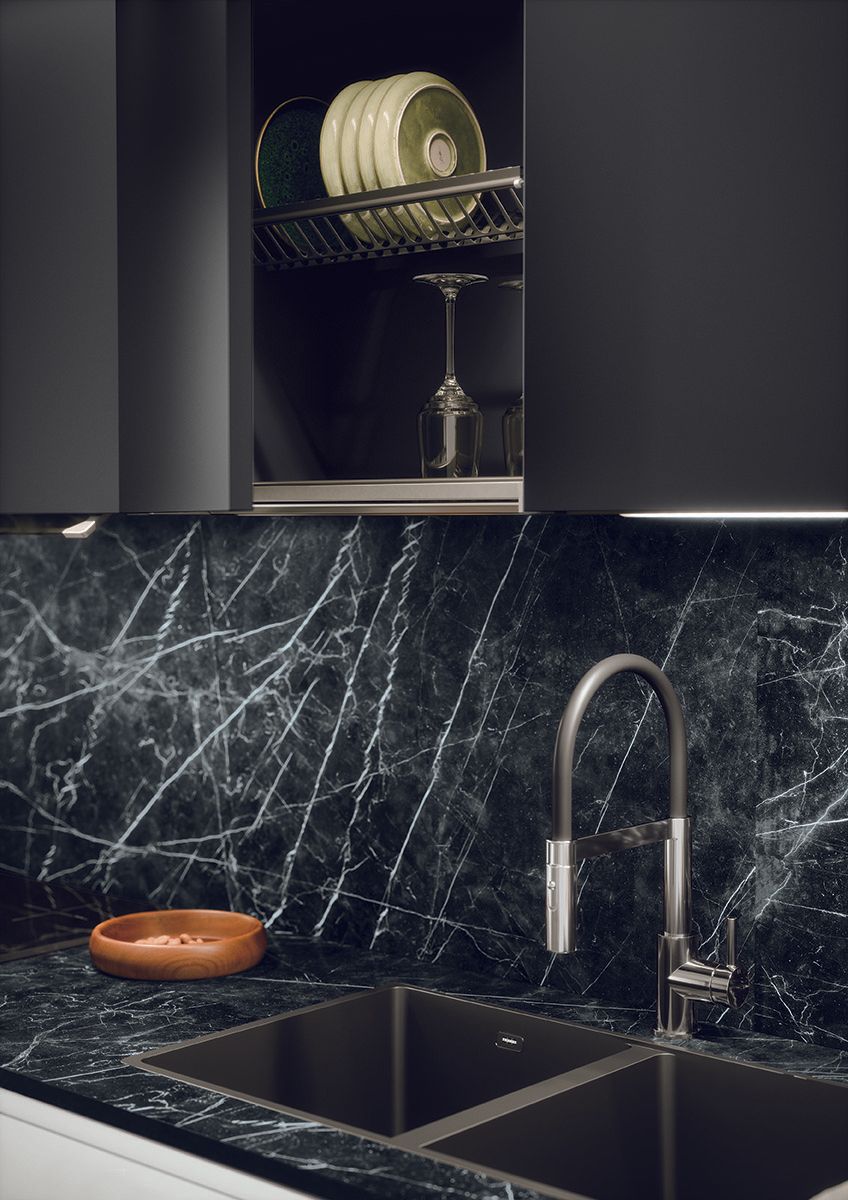 Long îlot noir et façades sable