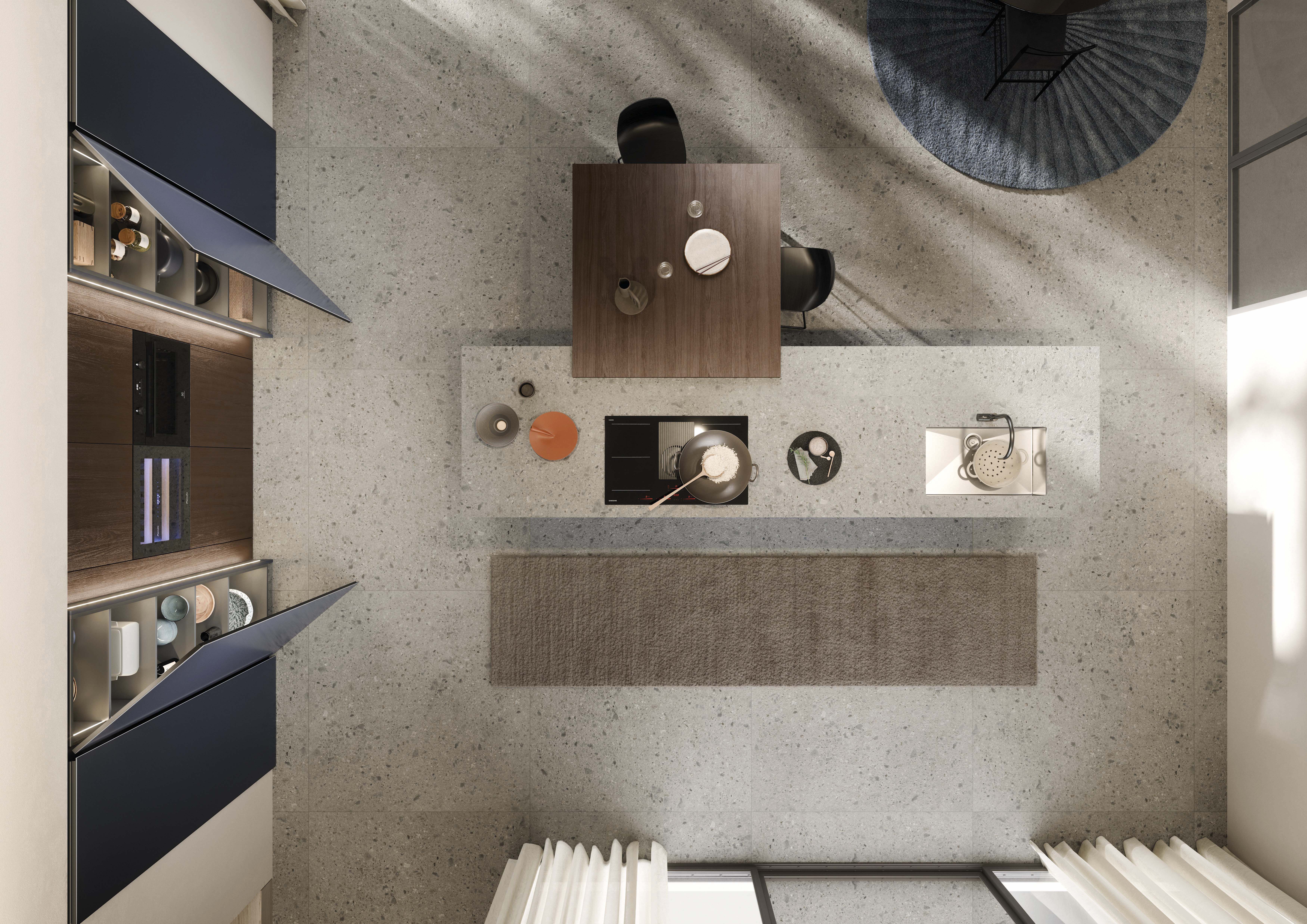 Vue zénithale d’un plan cuisson en marbre blanc